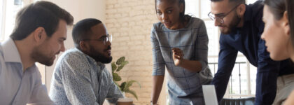 Serious,multiracial,corporate,business,team,and,black,leader,talk,during